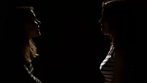 Two girls angry with each other. Anger, quarrel, violence. Unhappy mother and Stock Footage