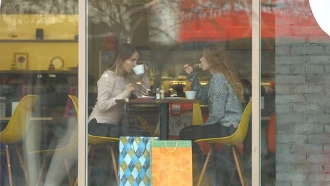 Two girls in a cafe. Видео 84835338