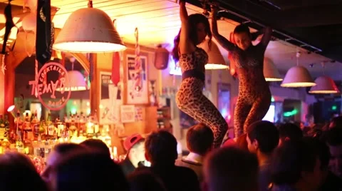 Two girls dance on bar in Theme in Moscow, Russia Stock Footage 45228974