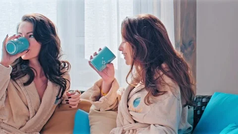 Two Girls Drinking Coffee Video stock 78230953