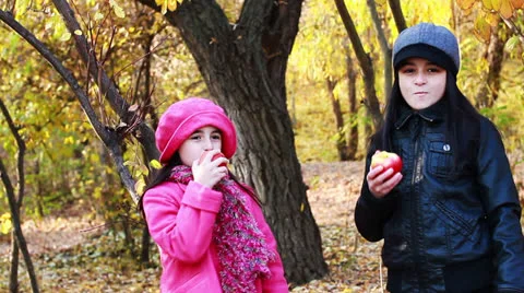 Two girls eating apples. Stock Footage 24671573