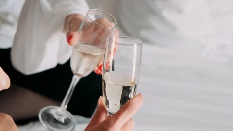 Two girls with glasses drinking Video stock 172044254