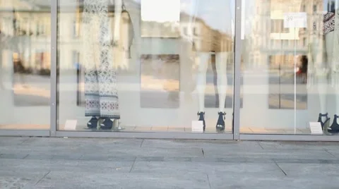 Two girls meet after shopping. Shop window background Stock Footage 55142453