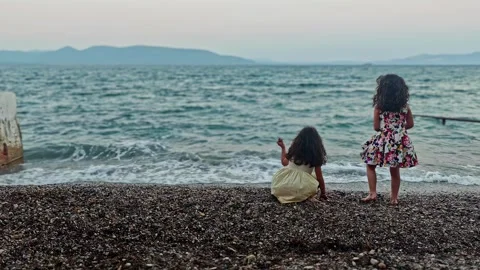 Two girls play on the beach Video stock 280607490