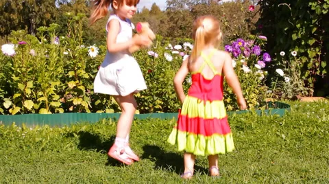 Two girls playing Stock Footage 29405275