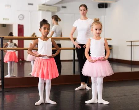 Two girls practicing choreographic elements 스톡 사진
