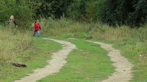 Two girls running down the path in the open air Stock-Footage 105267766