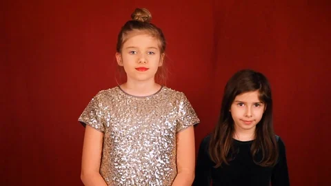 Two Girls Shushing Off Camera Sibling Stock Footage 115962238