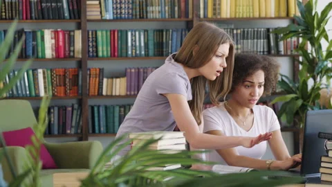 Two girls study and use laptop Video stock 89647760
