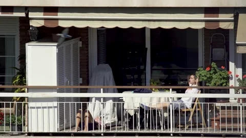 Sunbathing Neighbor Stock Footage ~ Royalty Free Stock Videos | Pond5