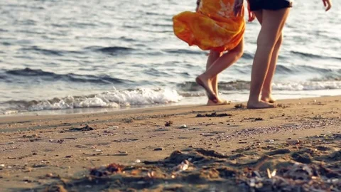 Two Girls Walking On The Beach Stock Footage 82036035