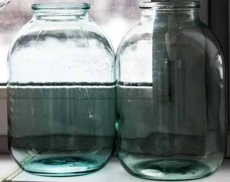 Two glass jars Stock Photos