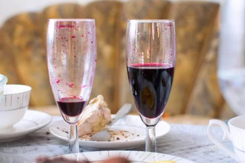 Two glass of red wine on the table on holiday Stock Photos