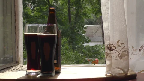 Two glasses and bottle of beer Stock Footage 91623165