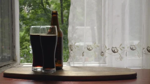 Two glasses of beer and bottle Stock Footage 91622947