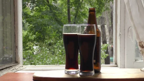 Two glasses of beer and bottle Stock Footage 91622994