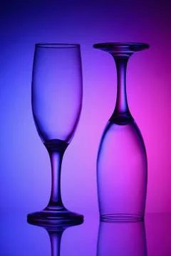 Two glasses in bicolor light Stock Photos