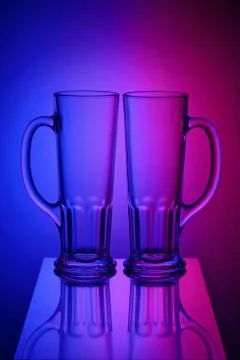 Two glasses in bicolor light Stock Photos