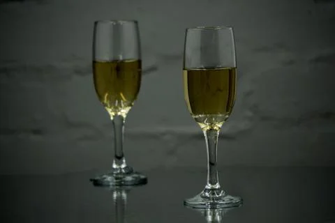 Two glasses of champagne on background Stock Photos
