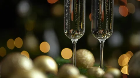 Two Glasses of Champagne with bokeh Video stock 249901816