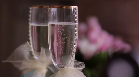 Two glasses of champagne with bubbles Stock Footage 55030287