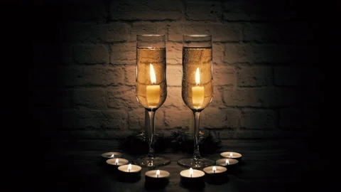 Two glasses of champagne in the candlelight Stock Footage 143193788