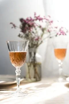 Two glasses of champagne on a dining table Stock Photos