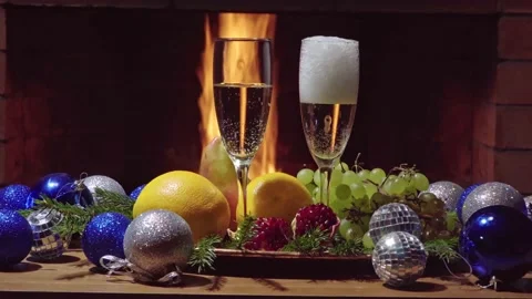 Two glasses of  champagne with flame on background Stock Footage 166062523