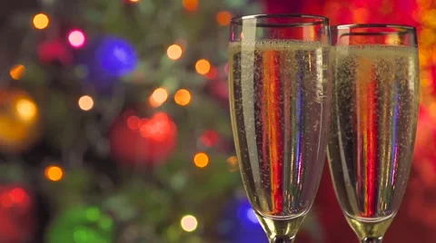 Two glasses of champagne ready for christmas celebration Stock Footage 56529108