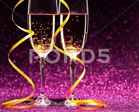 Two glasses of champagne ready for christmas celebration Stock Photos