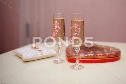 Two Glasses Of Champagne On The Table For The Wedding Ceremony