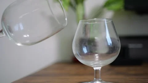 Two Glasses Clinking Together Producing Clear Resonant Sound for Celebration Video stock 321527444