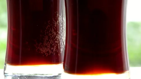 Two glasses of dark beer Stock Footage 91622868