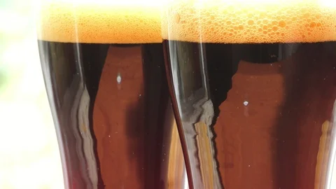 Two glasses of dark beer Stockbeeldmateriaal 91623227