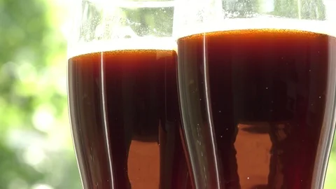 Two glasses of dark beer Stockbeeldmateriaal 91623329
