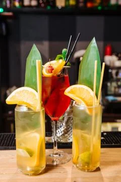 Two glasses of fresh soft drinks from orange and lemon. Stock Photos
