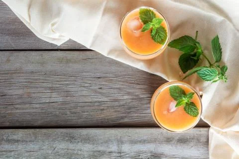 Two glasses of fruit smoothies Stock Photos