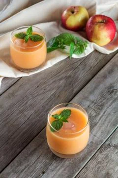 Two glasses of fruit smoothies Stock Photos