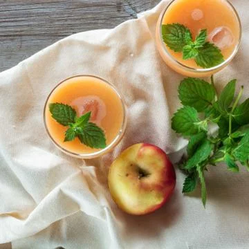 Two glasses of fruit smoothies Stock Photos