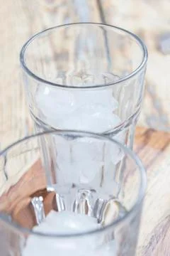Two glasses with ice cubes Stock Photos