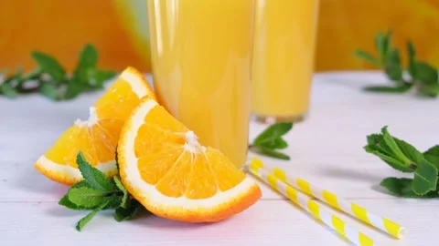 Two glasses of orange juice Stock Footage 154239265