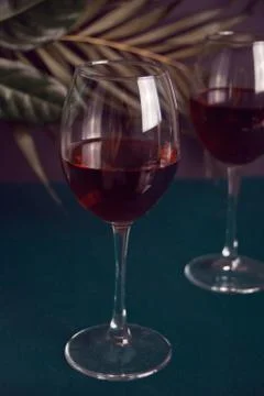 Two glasses with red grape wine. Romantic dinner concept. Stock Photos