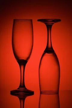 Two glasses in red light Stock Photos