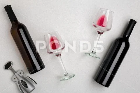 Two glasses of red wine and grapes. Top view Stock Photos