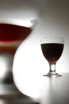 Two glasses of red wine isolated on background. Stock Photos