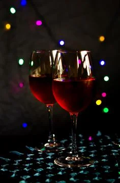 Two glasses of red wine on the table Stock Photos