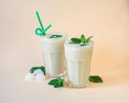 Two glasses of a refreshing cocktail with mint Stock Photos