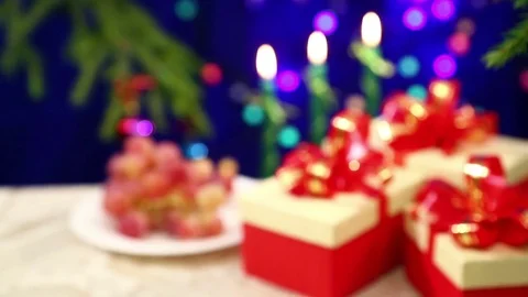 Two glasses with shompansky clink glasses close-up on a New Year's background Stock Footage 82882908
