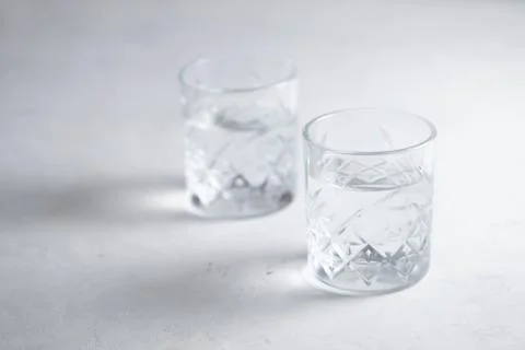 Two glasses of water on the table Stock Photos
