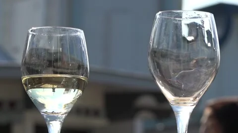 Two glasses of white  wine for outside dining Stock Footage 52724184